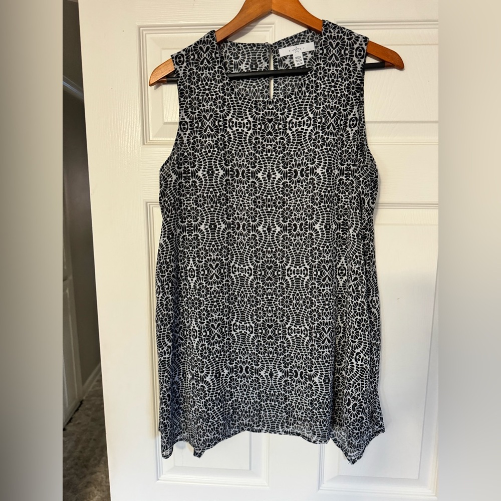 Cute flowy tank top.  Size medium.  Black and white.